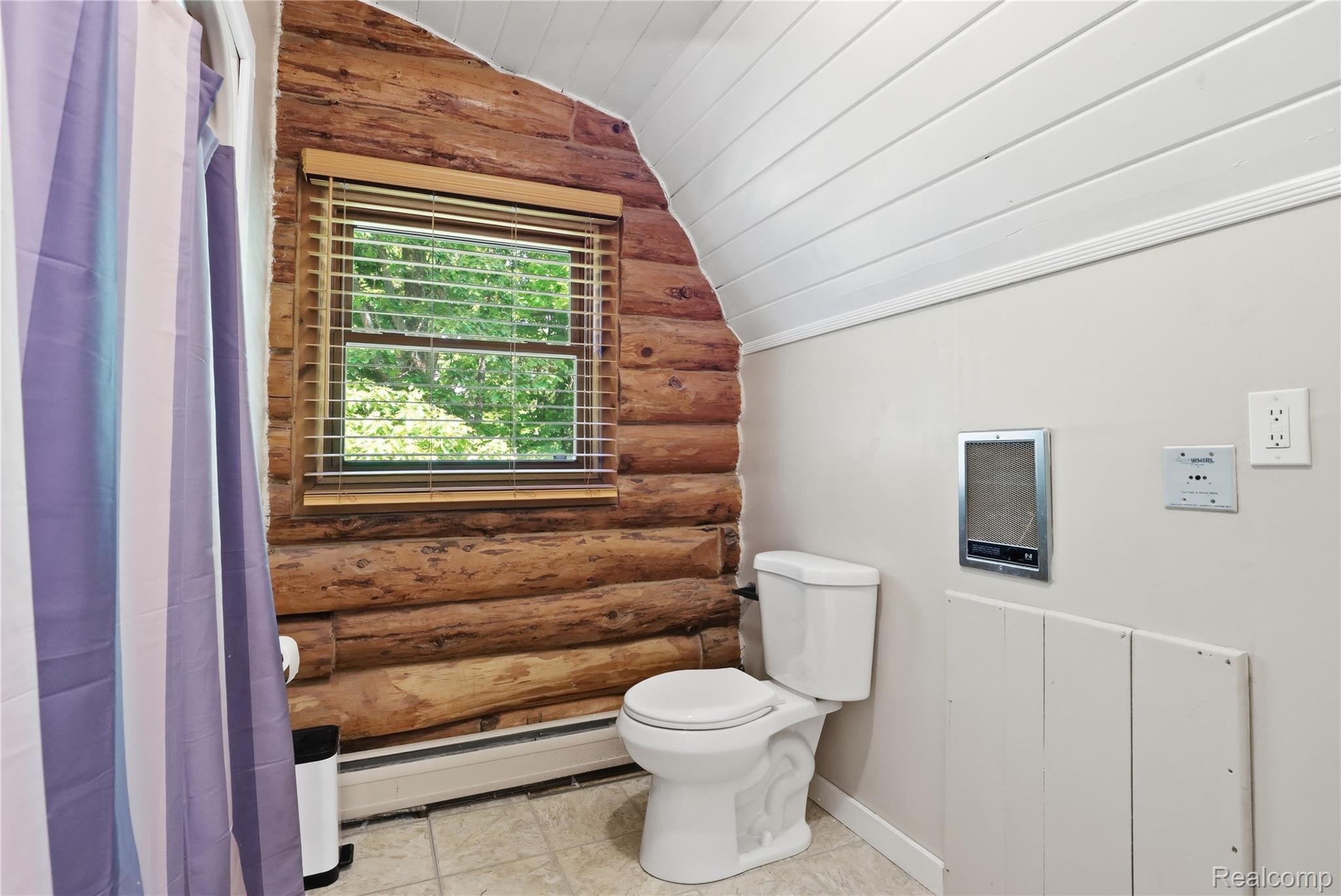 14830 Sheridan Road Byron, MI 48418 - Photo 30 of 74 Bathroom featuring log wall construction, a window with blinds, white paneled ceiling, tiled flooring, and a baseboard heater