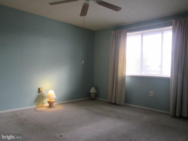 550 Heather Ridge Drive, Unit M Frederick, MD 21702 - Photo 8 of 9 an empty room with a window
