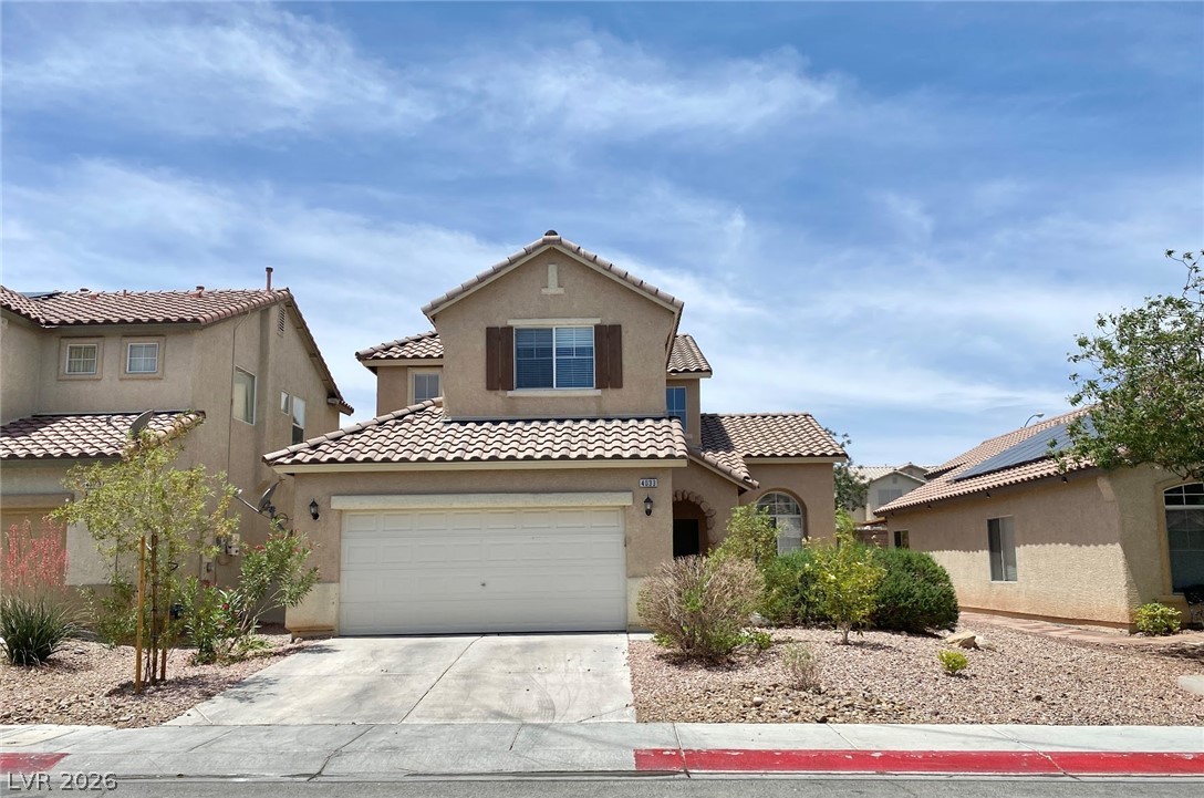 This residence showcases classic architecture and a well-maintained exterior, offering inviting curb appeal.