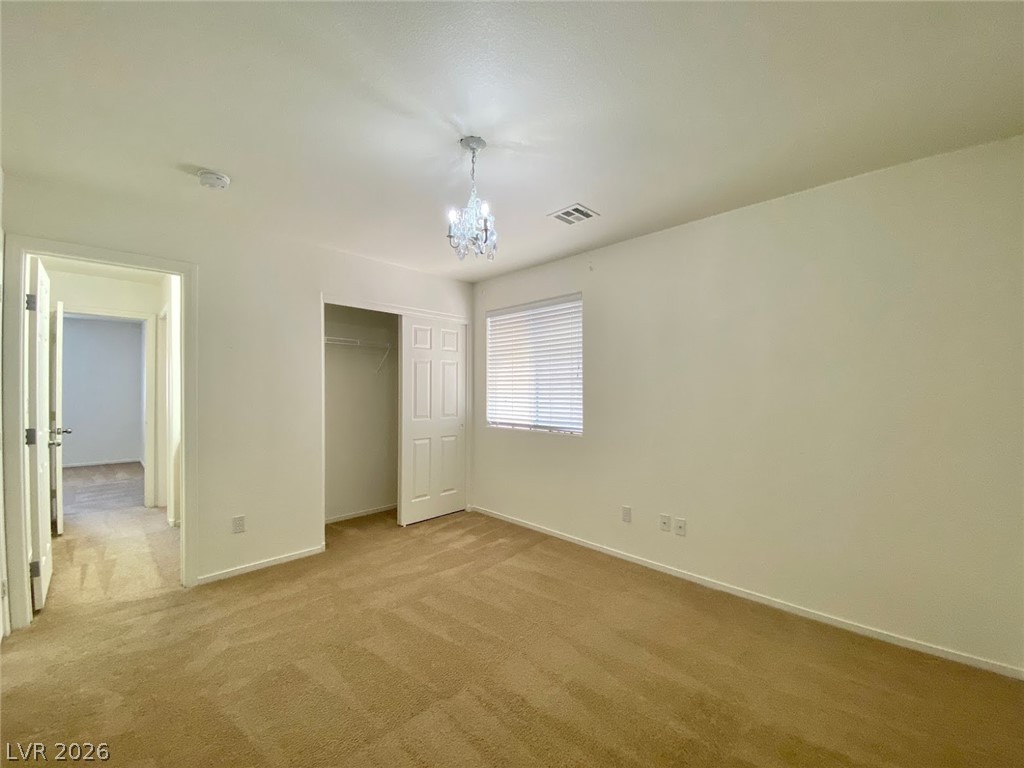 4033 Spring Line Street North Las Vegas, NV 89032 - Photo 19 of 30 Bright and airy room with plush carpeting and a large window.
