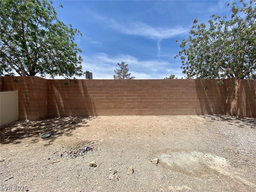 4033 Spring Line Street North Las Vegas, NV 89032 - Photo 30 of 30 This private yard offers a spacious area ready for landscaping and outdoor enjoyment.