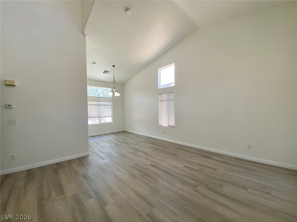 4033 Spring Line Street North Las Vegas, NV 89032 - Photo 5 of 30 Bright and open living space with soaring ceilings and abundant natural light.