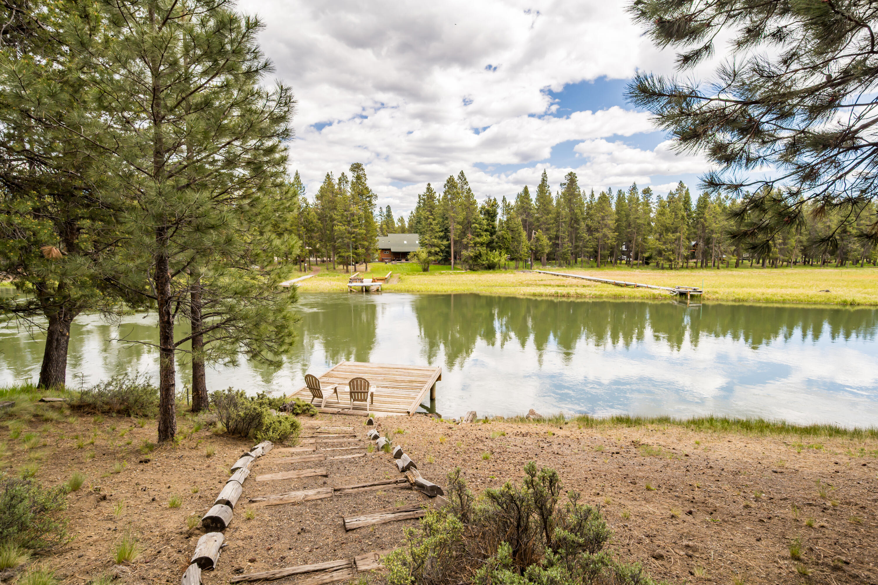 17026 Sharp Drive Bend, OR 97707 - Photo 15 of 72 a view of a lake with houses in the back