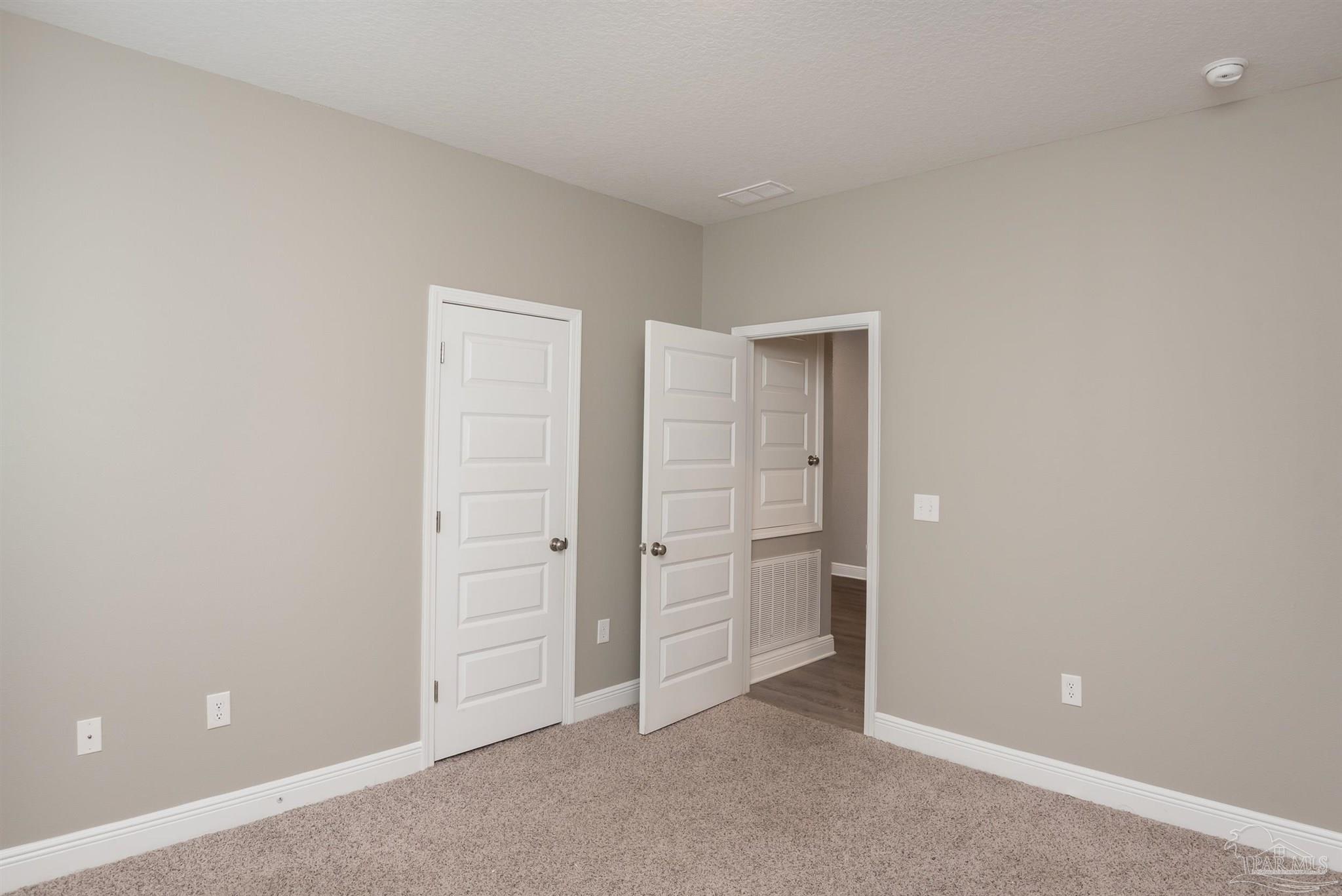 7882 Burnside Loop Pensacola, FL 32526 - Photo 19 of 28 an empty room with closet area