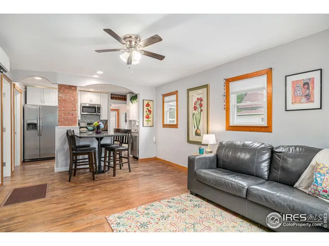 a living room with furniture and window