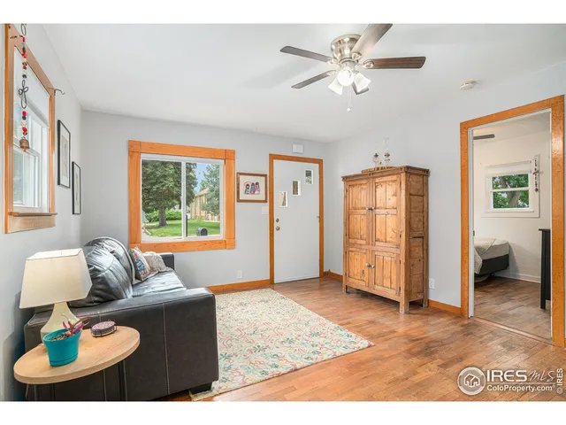 a living room with furniture and window