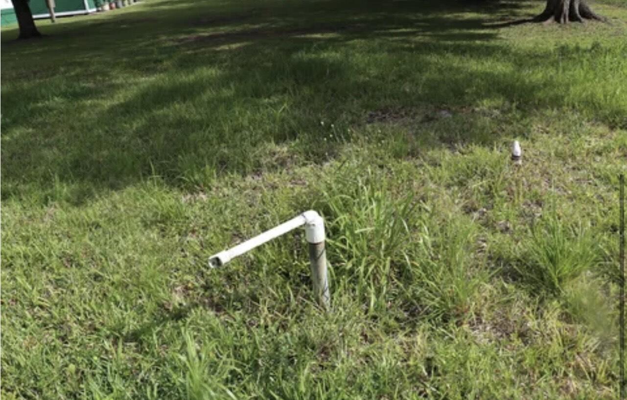 30910 Northeast 23rd Way Okeechobee, FL 34972 - Photo 8 of 8 a house view with a backyard space