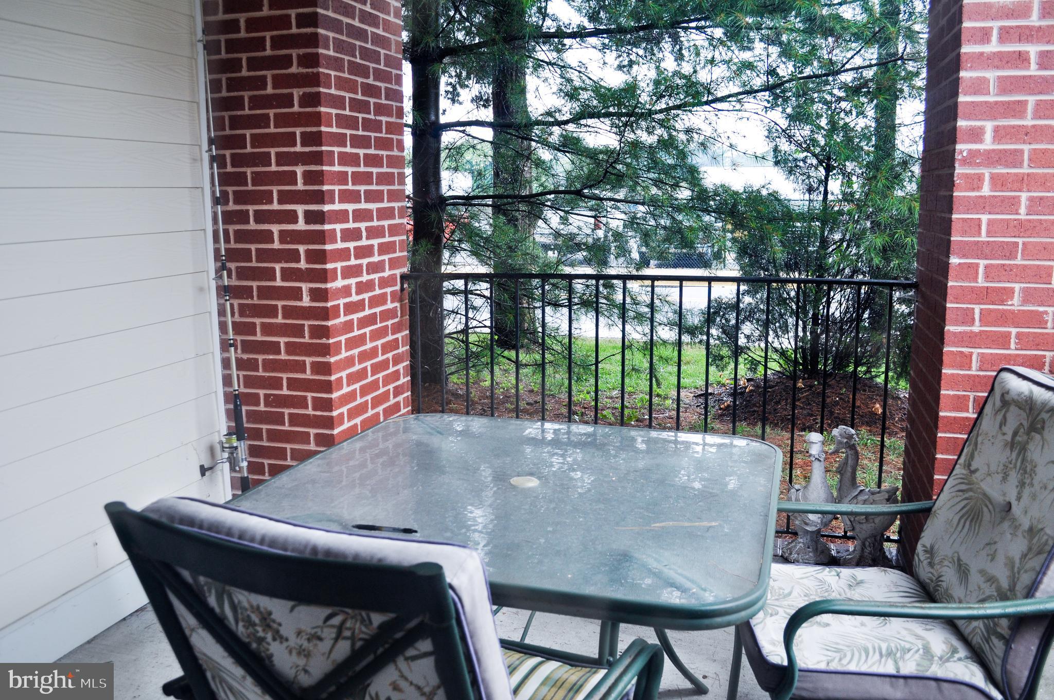 703 Canning House Row, Unit 902 Milton, DE 19968 - Photo 10 of 18 a view of balcony and patio