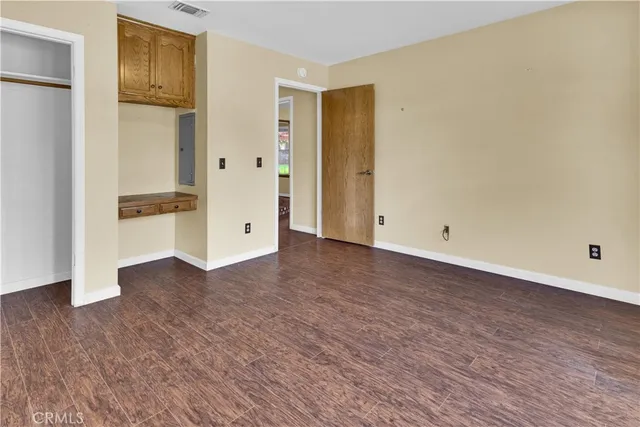 a view of a patio with wooden floor