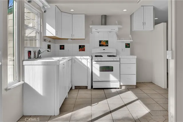 a view of livingroom with hardwood floor and hallway