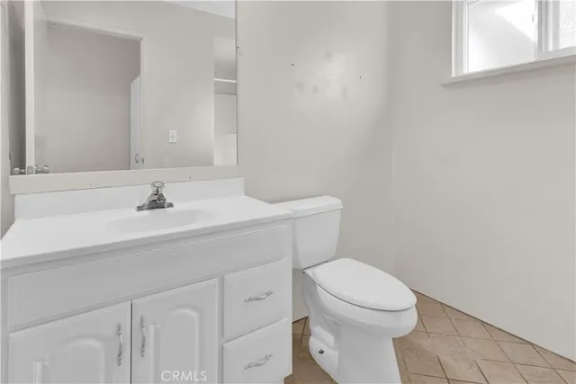 an aerial view of residential houses with city view