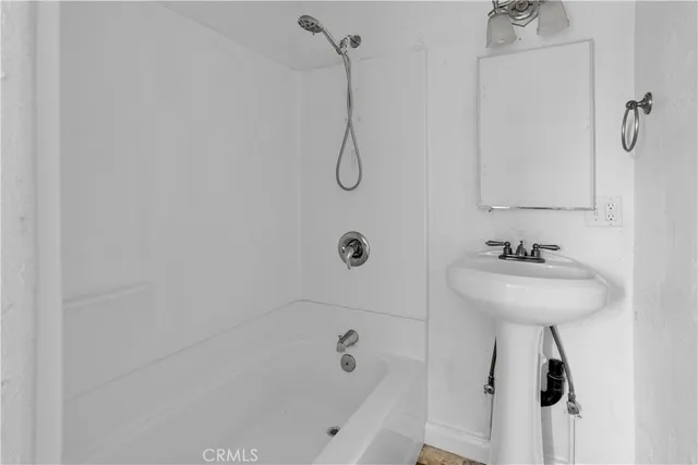 an aerial view of residential houses with city view