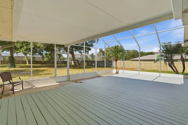 a view of a swimming pool with seating area