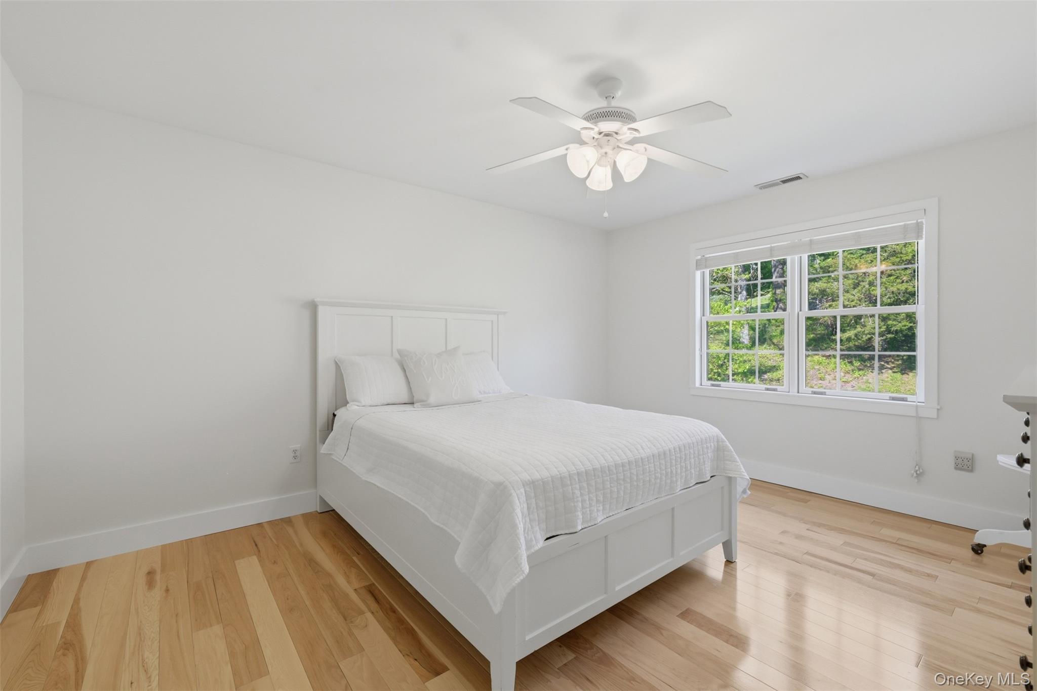 233 Devon Farms Road Stormville, NY 12582 - Photo 30 of 48 a bedroom with a bed and a window