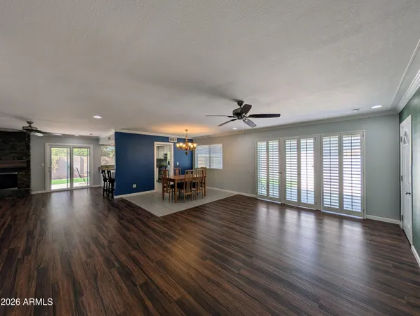 a dining room with furniture and window