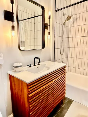 a bathroom with a sink and a bathtub