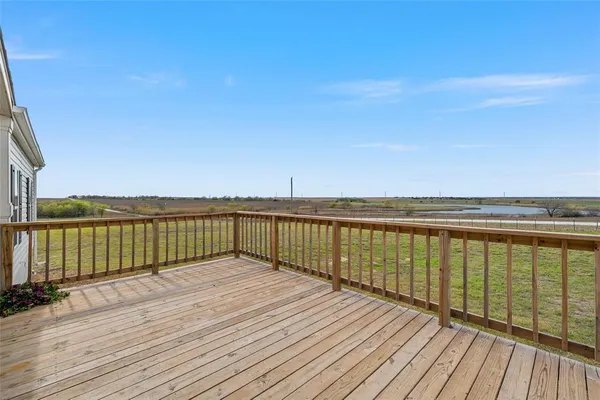 a view of wooden floor with a lake