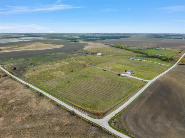 a view of an outdoor space and tennis court