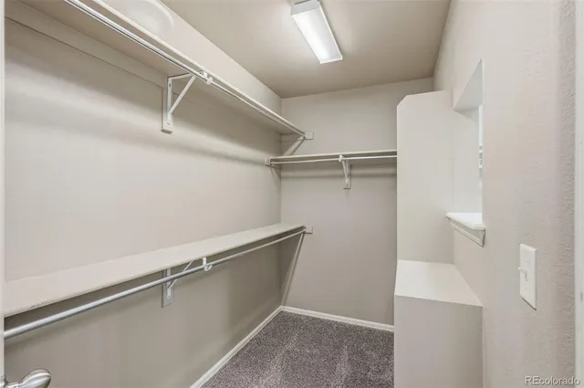 a view of an empty walk in closet