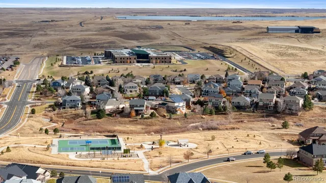 a view of a balcony with wooden floor