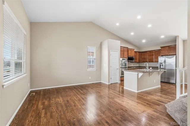 a view of kitchen with wooden floor