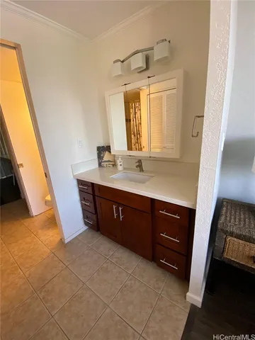 a bathroom with a sink a mirror and a bathtub