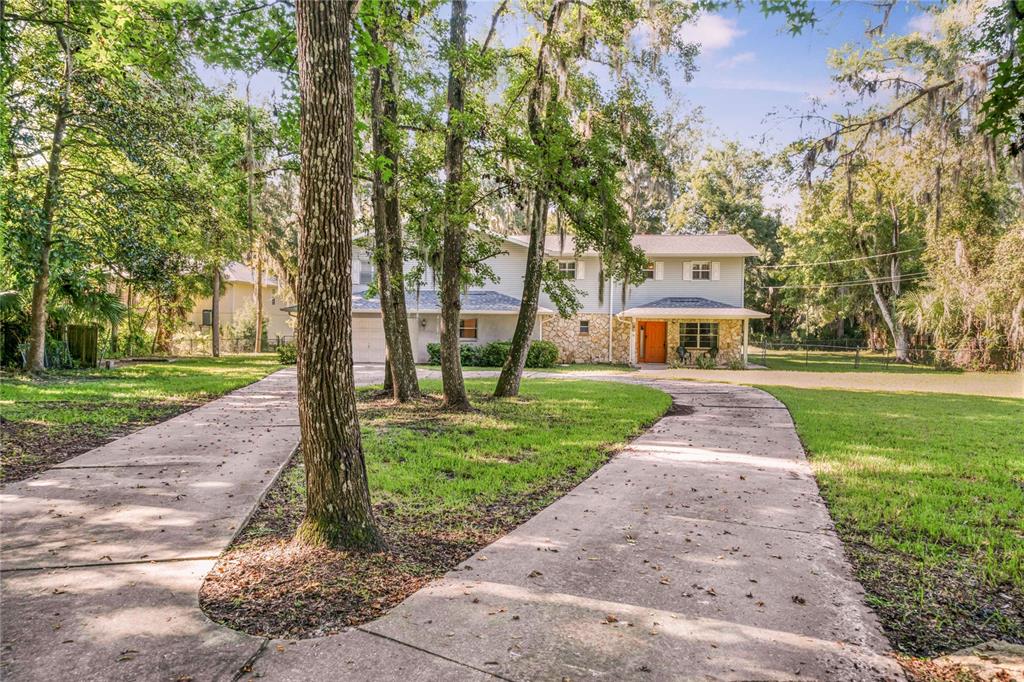6 Winding River Lane Inglis, FL 34449 - Photo 1 of 1 a front view of a house with a yard
