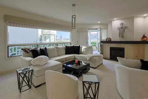 a living room with furniture and a couch