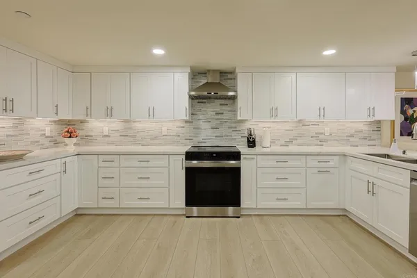 a bedroom with a bed and a fireplace