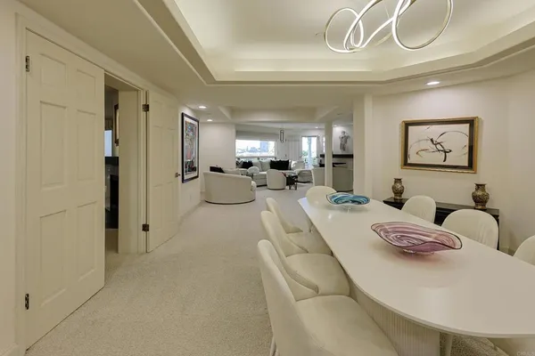 a bedroom with a bed and a mirror