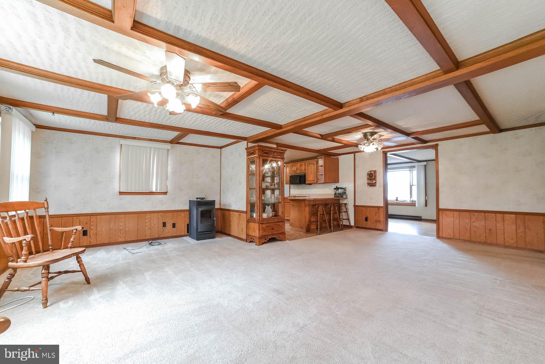 17309 Jutland Road St. Inigoes, MD 20684 - Photo 22 of 45 Great Room with Pellet Stove