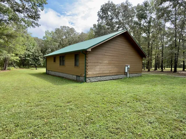 a view of a backyard with a garden
