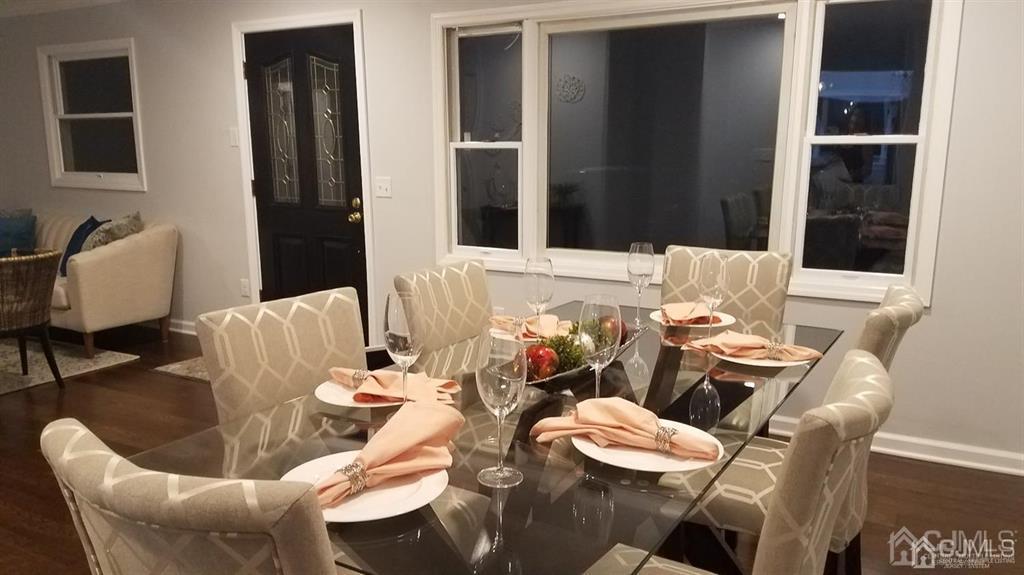 26 Richmond Road Edison, NJ 08817 - Photo 4 of 29 a dining room with furniture and wooden floor