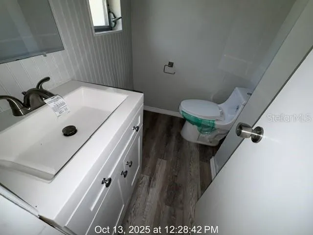 a bathroom with a sink and a toilet