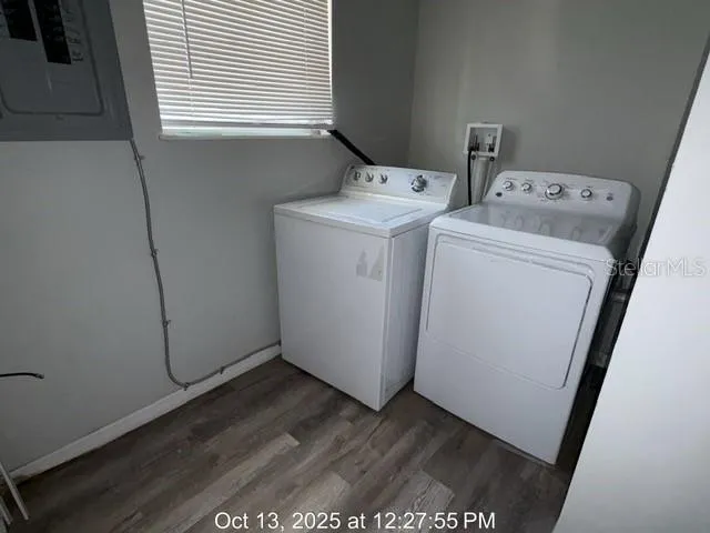 a utility room with dryer and washer
