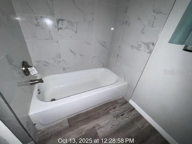 a bathroom with a tub