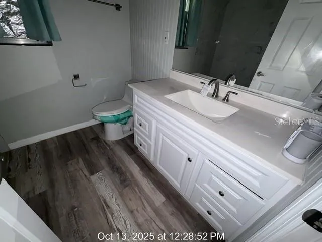 a bathroom with a sink and a toilet