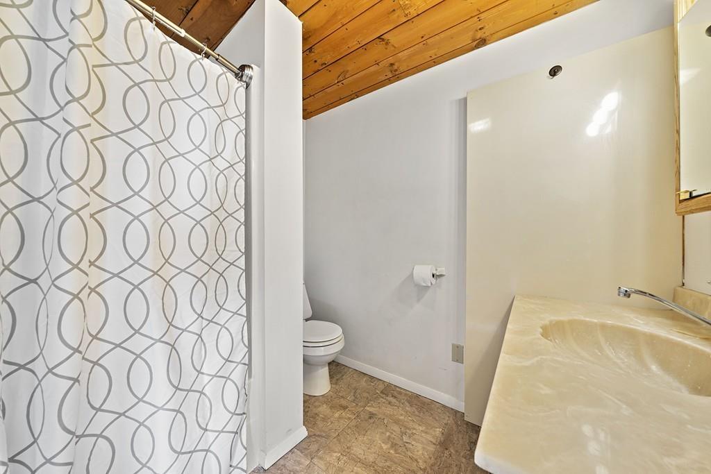 33 Fort Point Road Weymouth, MA 02191 - Photo 30 of 41 a bathroom with a sink and a toilet