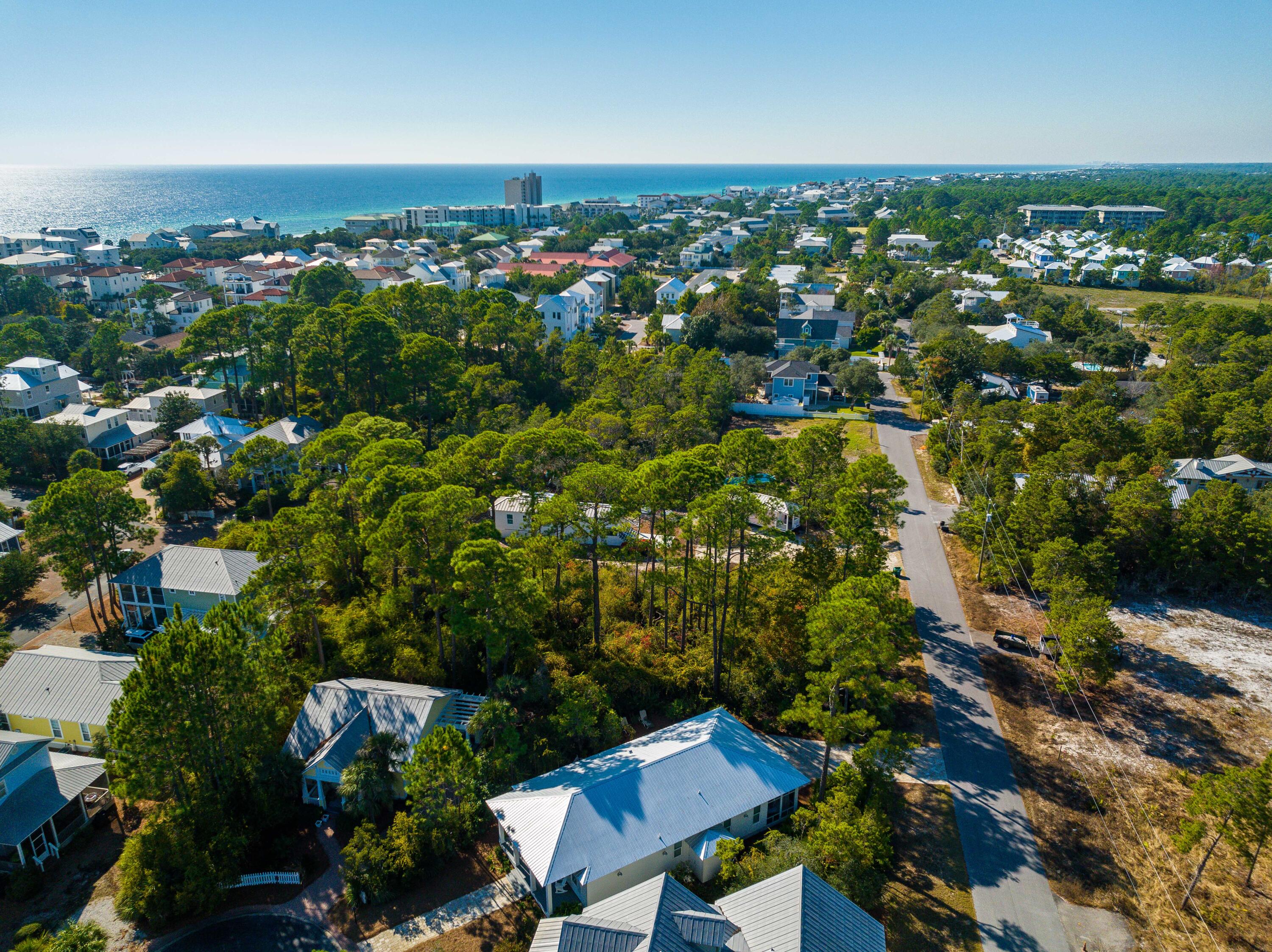 0 Lee Place Santa Rosa Beach, FL 32459 - Photo 20 of 23 an aerial view of residential houses with outdoor space and trees