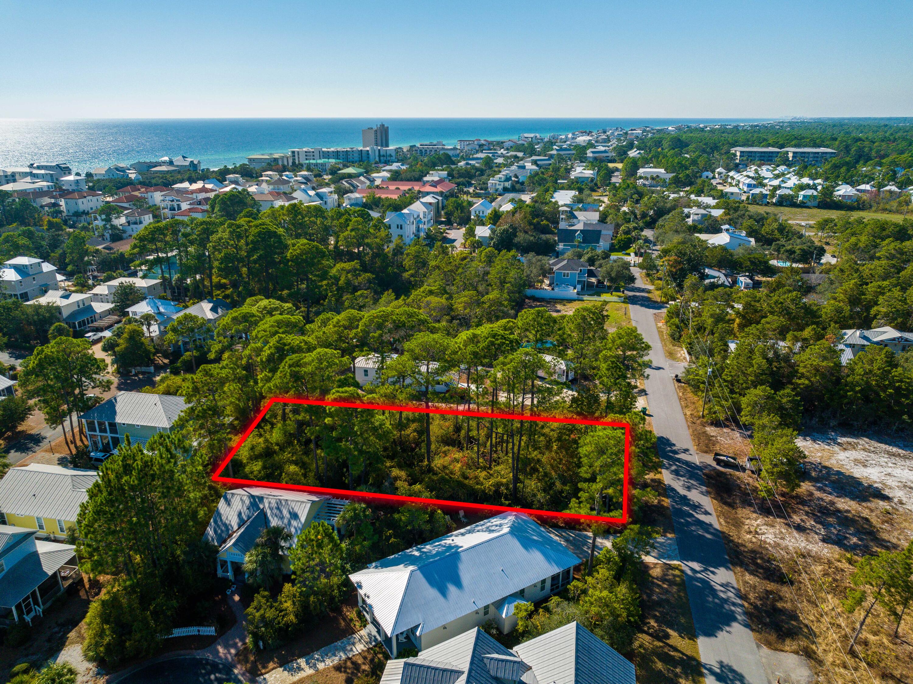 0 Lee Place Santa Rosa Beach, FL 32459 - Photo 3 of 23 an aerial view of residential houses with outdoor space and trees
