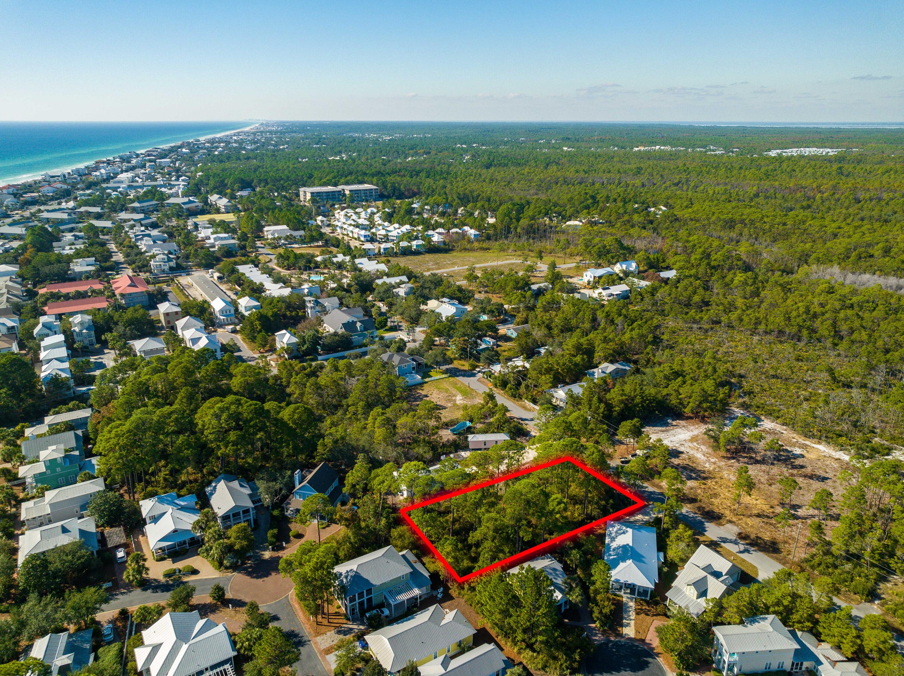 0 Lee Place Santa Rosa Beach, FL 32459 - Photo 8 of 23 an aerial view of residential houses with outdoor space and trees