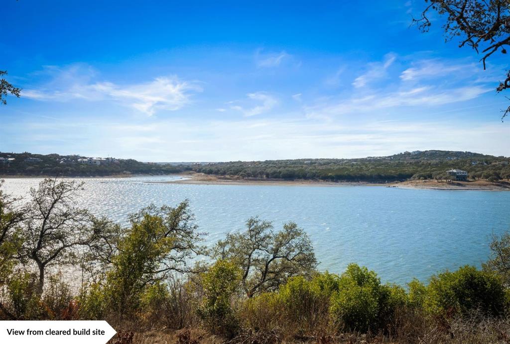 8005 Sharon Road Volente, TX 78641 - Photo 11 of 24 a view of a lake from a yard