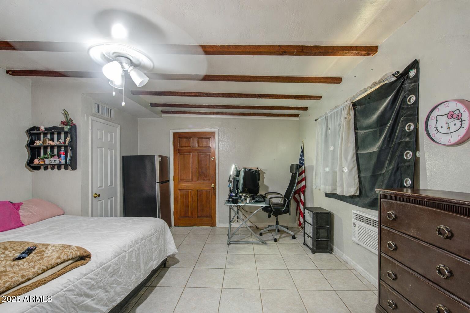 3107 West Montebello Avenue Phoenix, AZ 85017 - Photo 23 of 30 a bedroom with a bed and furniture