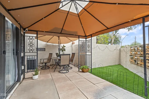 aerial view of a house with a yard