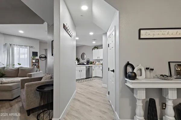 a kitchen with a sink stove and microwave