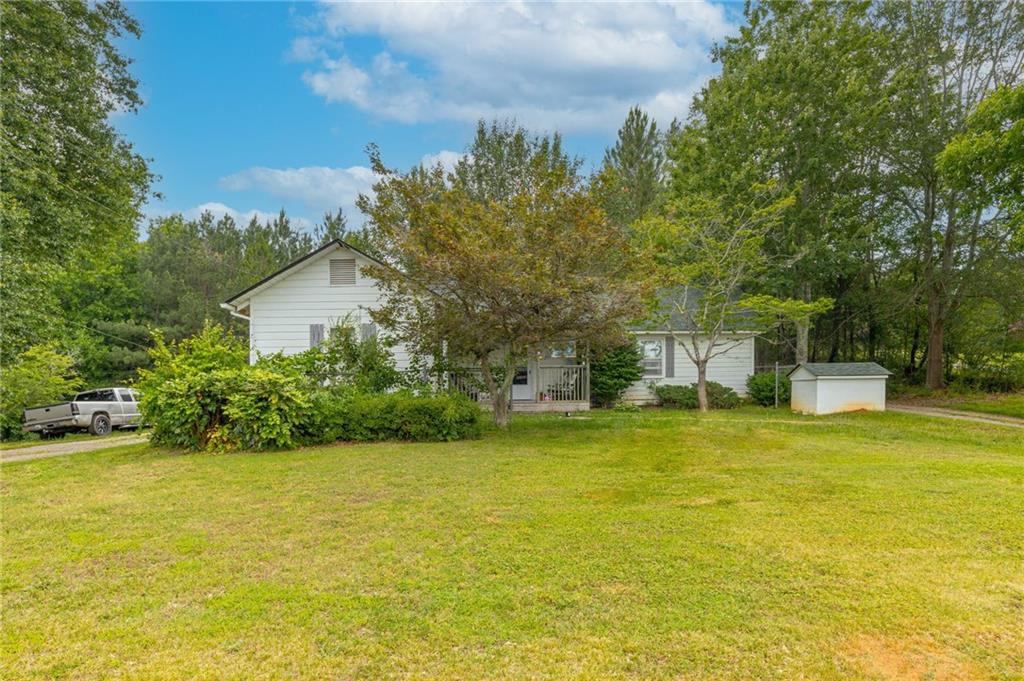 a view of a swimming pool and an outdoor space