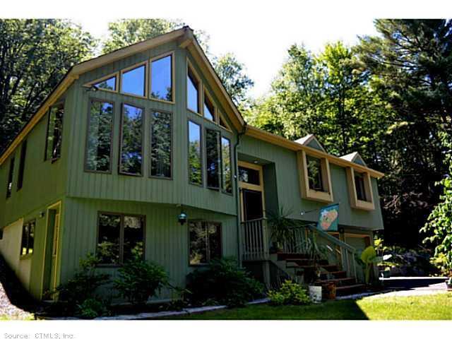 97 Eddy Road Barkhamsted, CT 06063 - Photo 1 of 1 a view of a house with a yard