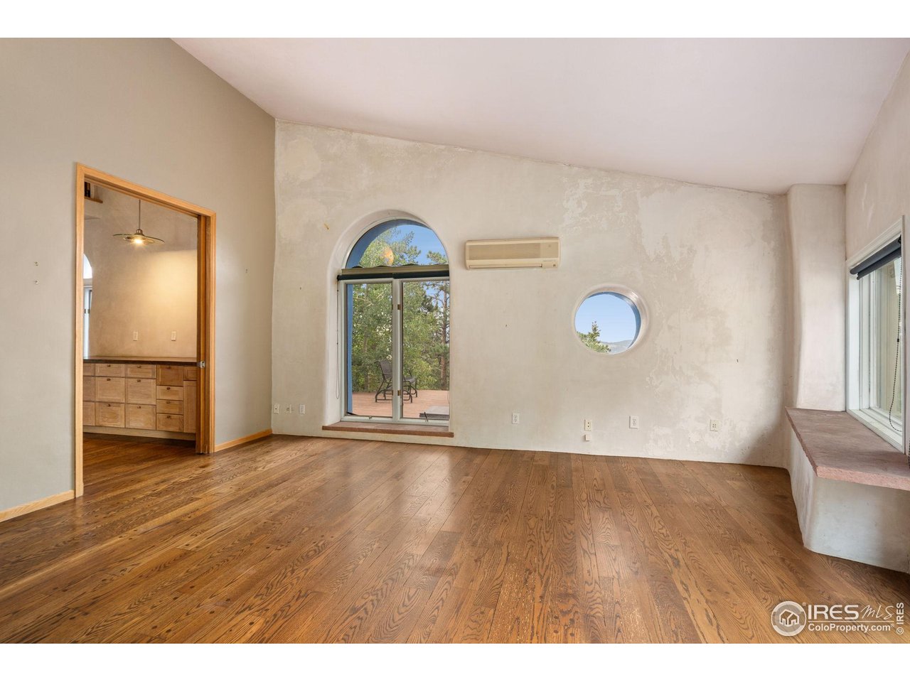 1000 Alaska Road Boulder, CO 80302 - Photo 15 of 50 a view of empty room with wooden floor and fan