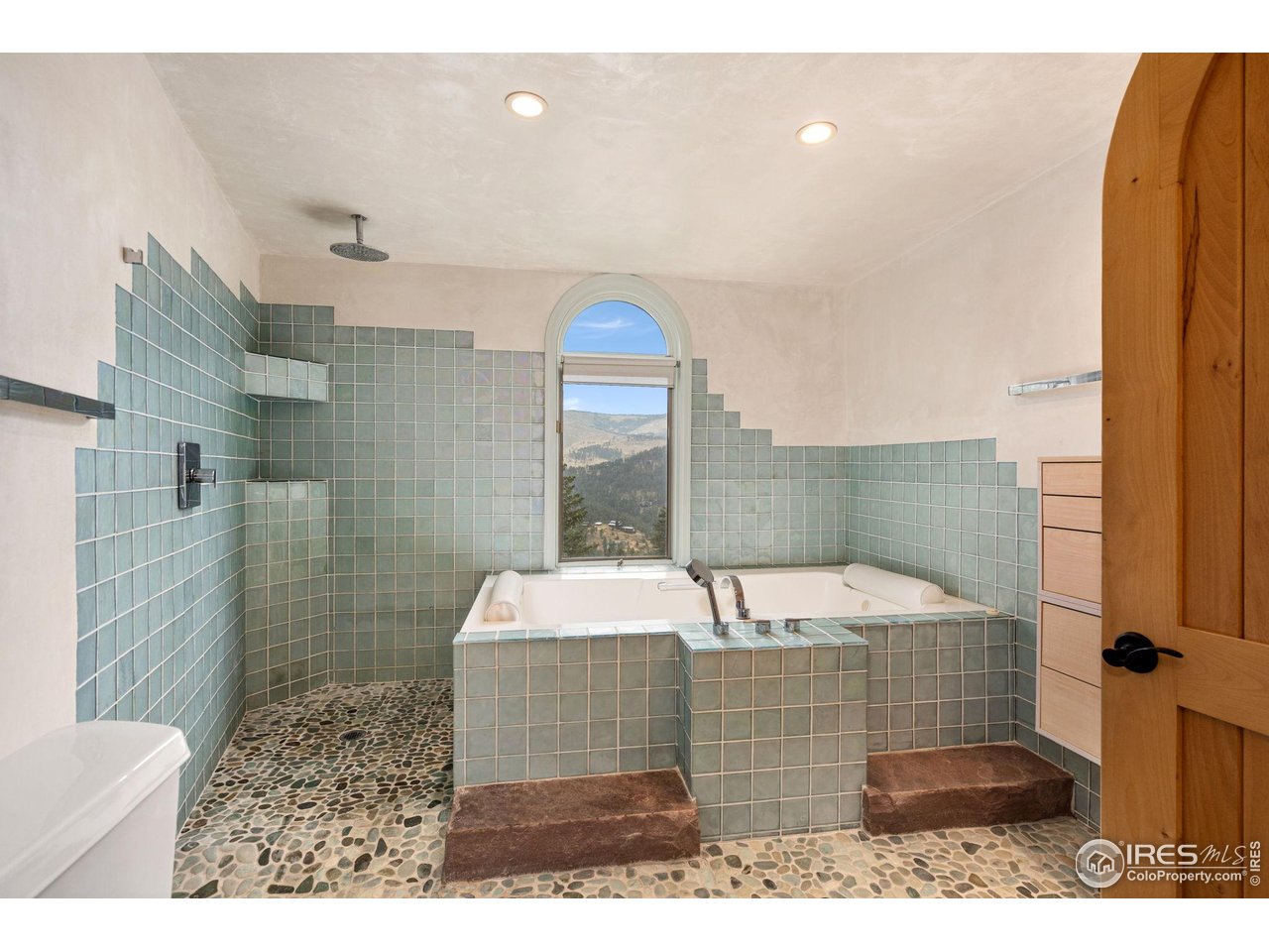 1000 Alaska Road Boulder, CO 80302 - Photo 21 of 50 a bathroom with a sink and a shower