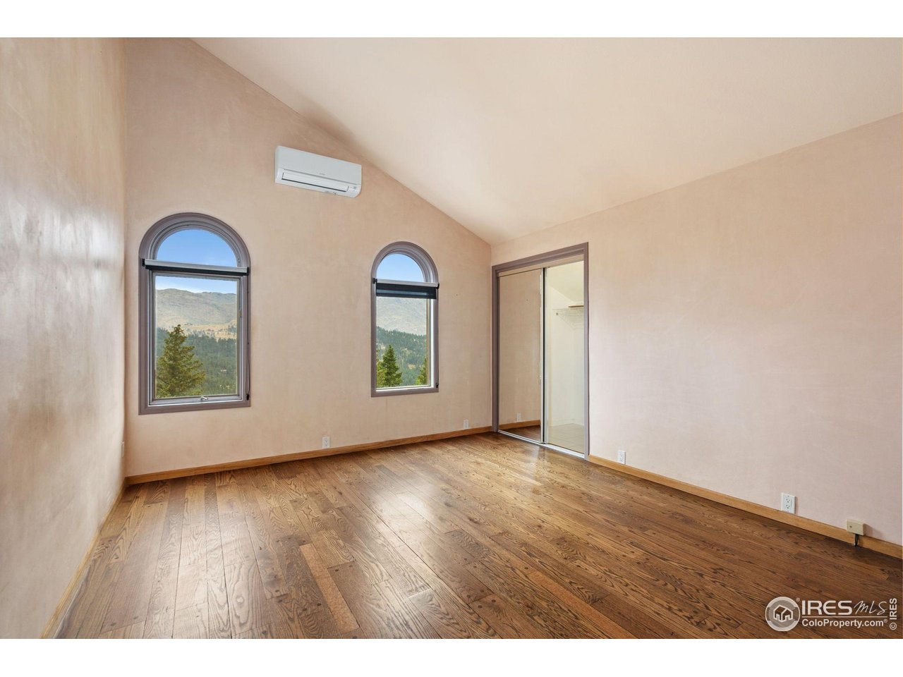 1000 Alaska Road Boulder, CO 80302 - Photo 22 of 50 a view of room with window and wooden floor